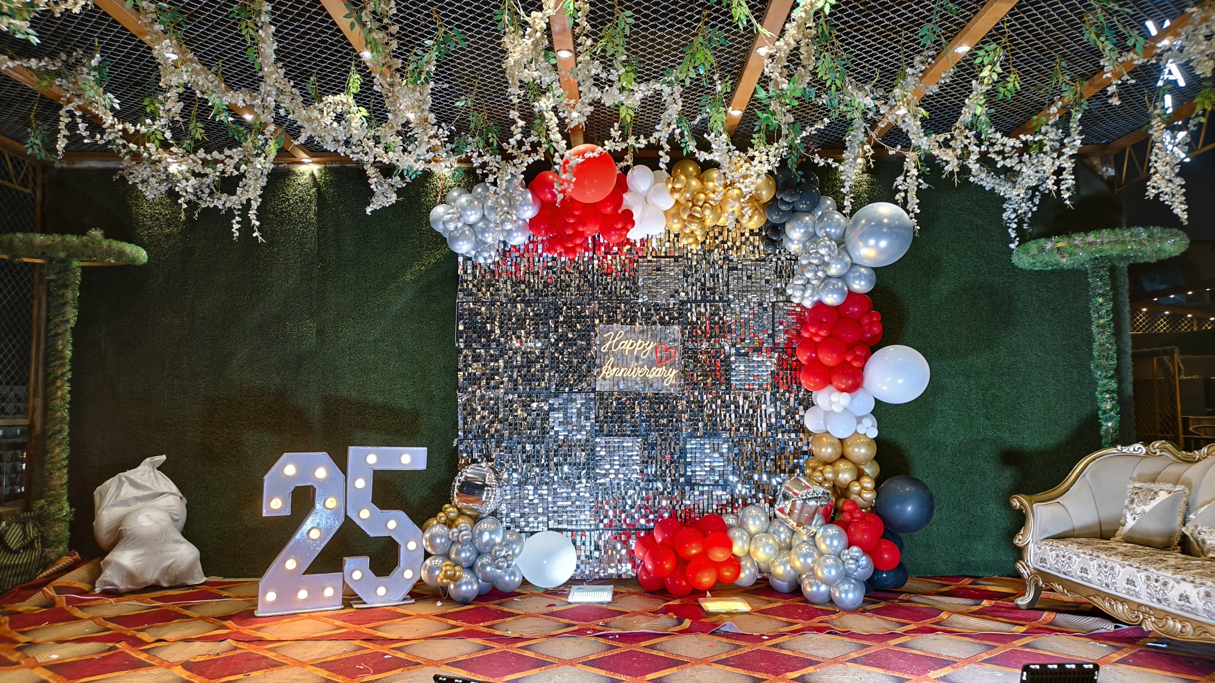 Real silver and red anniversary decoration by Shine Celebrations
